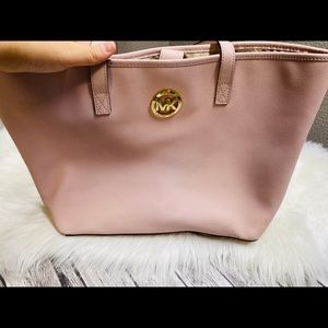 Pink Michael Kors purse.